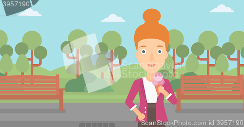 Image of Woman holding icecream.