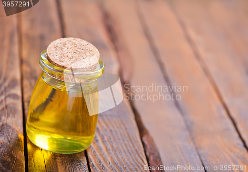 Image of oil in glass bottle