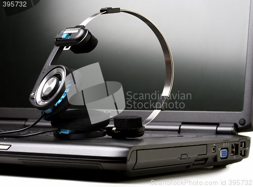 Image of Laptop and headphones