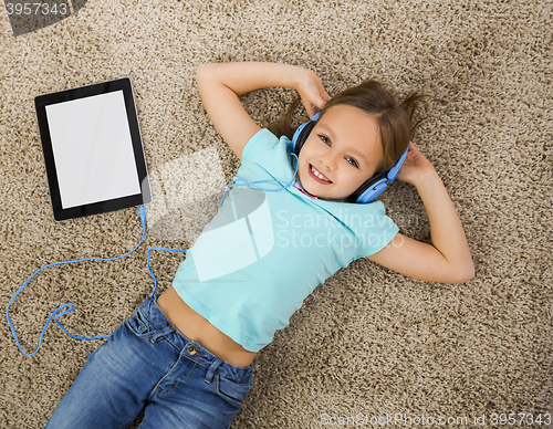 Image of Girl listen music
