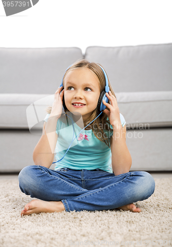 Image of Cute girl listen music