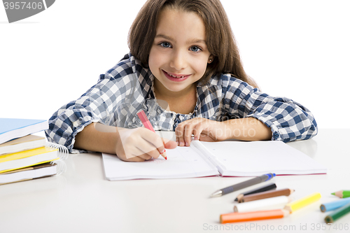 Image of Little girl making drawings