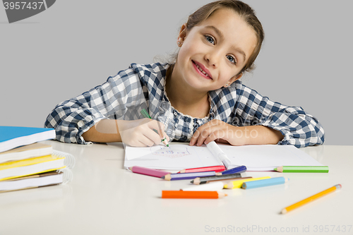 Image of Little girl making drawings