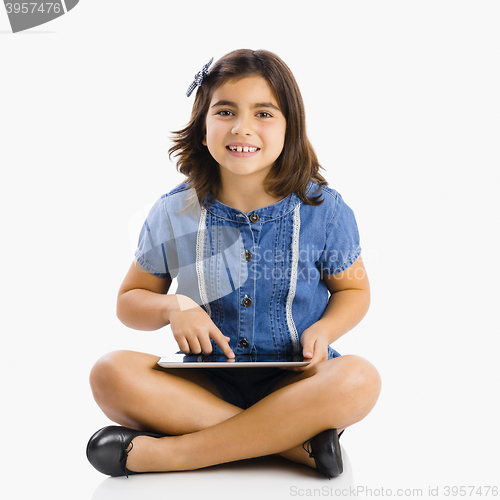 Image of Young girl using a tablet