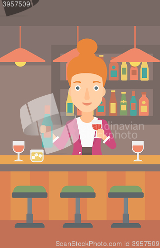 Image of Bartender standing at the bar counter.