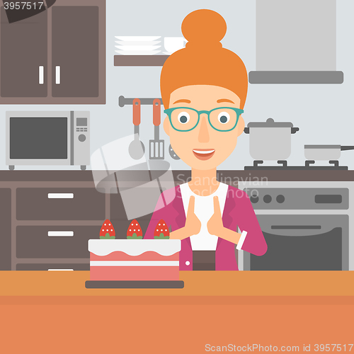 Image of Woman looking at cake.