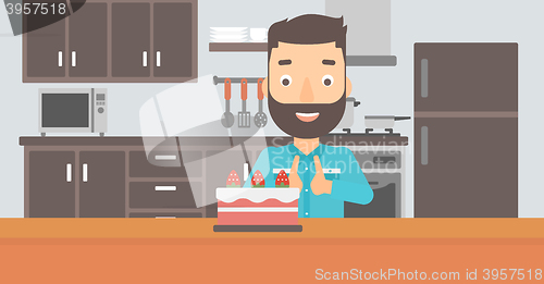 Image of Man looking at cake.