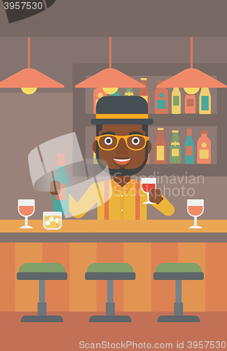 Image of Bartender standing at the bar counter.