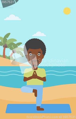 Image of Man practicing yoga.