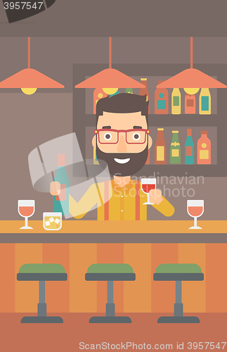 Image of Bartender standing at the bar counter.