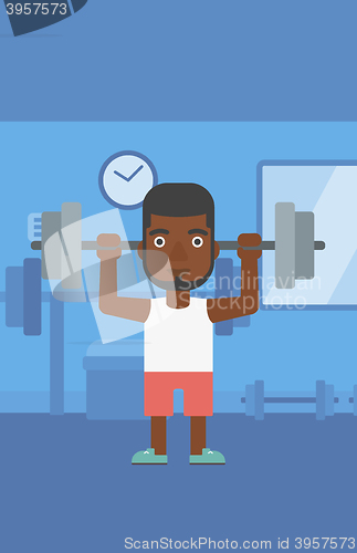 Image of Man lifting barbell.