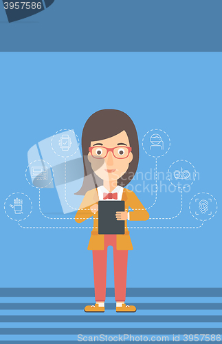 Image of Woman holding tablet computer.