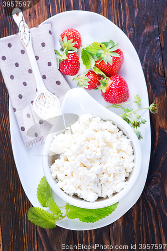 Image of cottage with strawberry