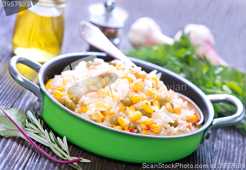 Image of boiled rice with vegetables