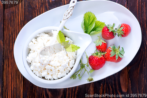 Image of cottage with strawberry