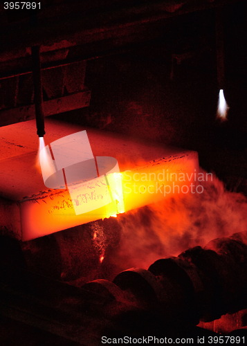 Image of Gas cutting of the hot metal in a plant