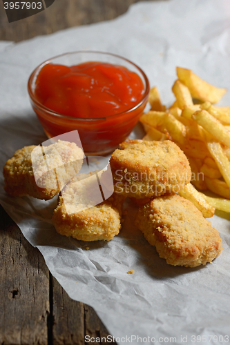 Image of fried chicken with fries 