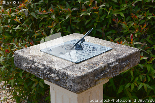 Image of Sundial on a stone pedestal 