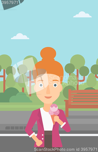 Image of Woman holding icecream.