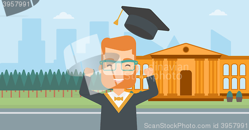 Image of Graduate throwing up his hat.