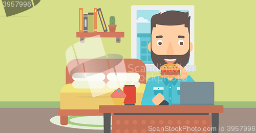Image of Man eating hamburger. 