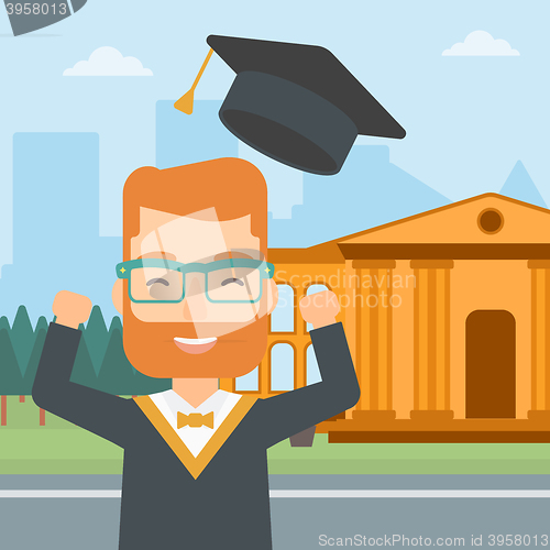 Image of Graduate throwing up his hat.