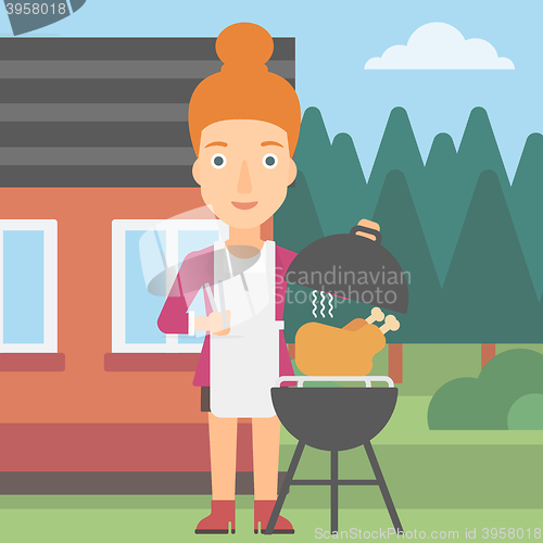 Image of Woman preparing barbecue.