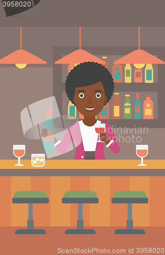 Image of Bartender standing at the bar counter.