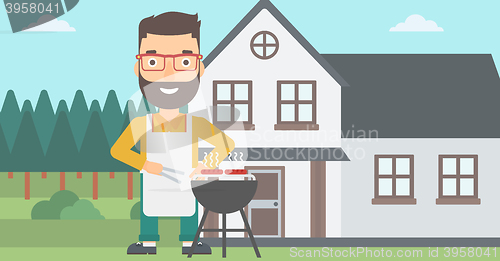 Image of Man preparing barbecue.