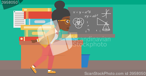 Image of Woman with pile of books.