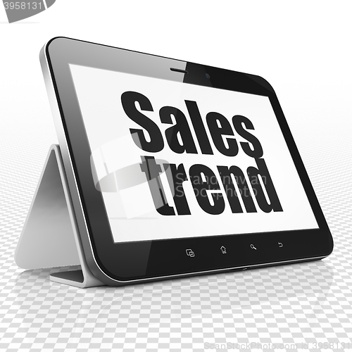 Image of Advertising concept: Tablet Computer with Sales Trend on display