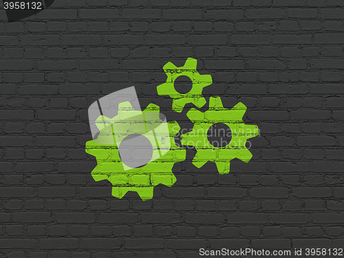Image of Web development concept: Gears on wall background