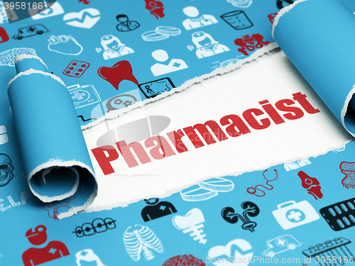 Image of Healthcare concept: red text Pharmacist under the piece of  torn paper