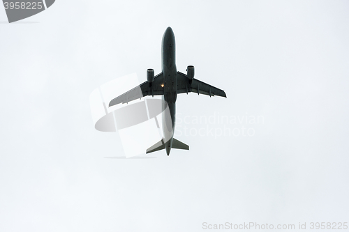 Image of Airplane taking off during rain