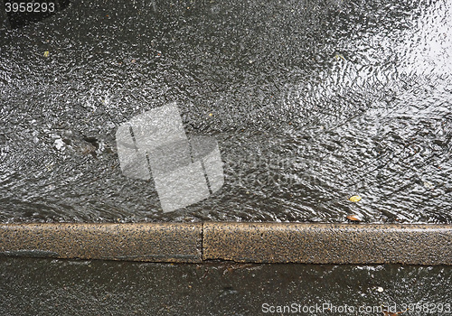 Image of Pouring rain water