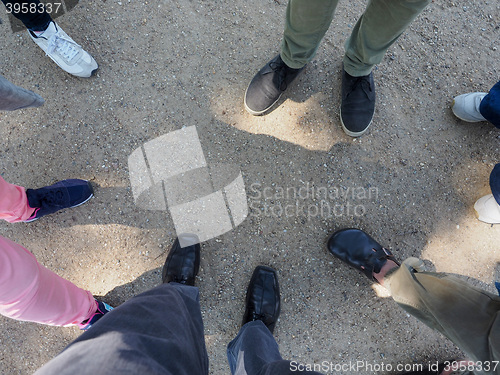 Image of Three people feet