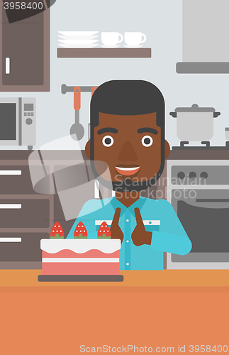 Image of Man looking at cake.