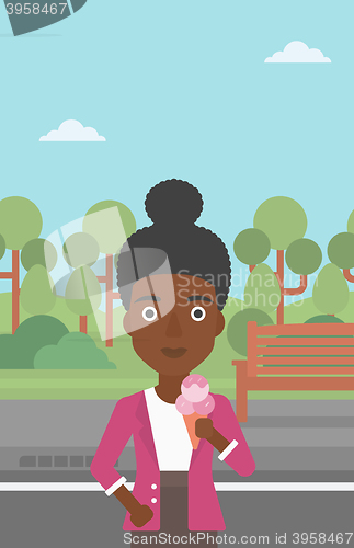 Image of Woman holding icecream.