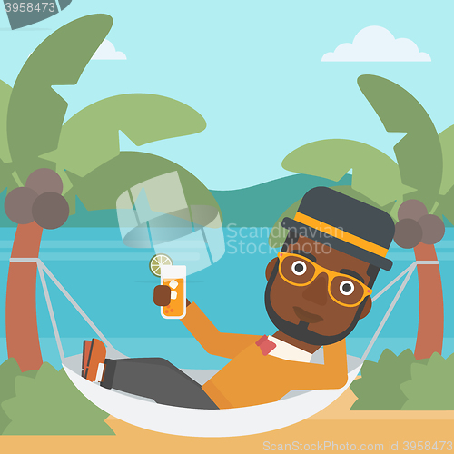 Image of Man chilling in hammock.