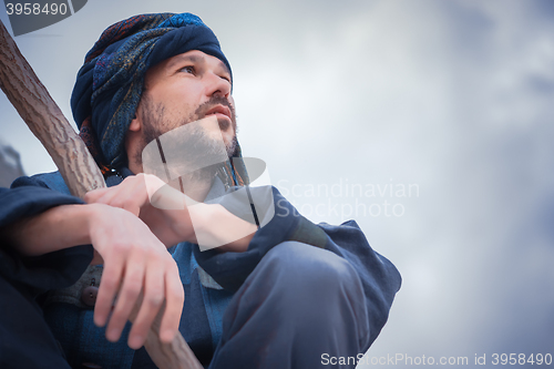 Image of Portrait of a man in blue turban