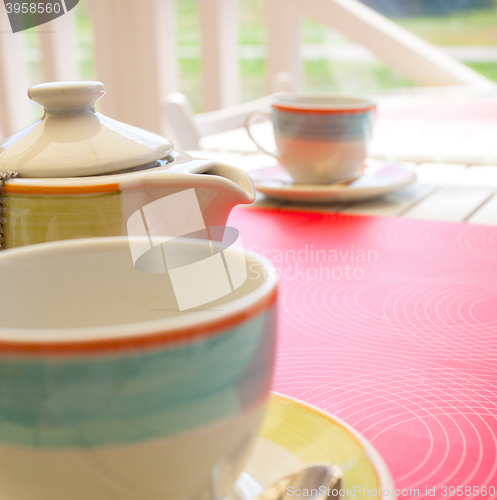 Image of cups and a teapot