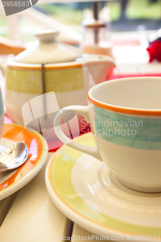 Image of Black fruit tea is brewed in a teapot