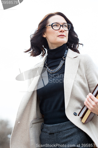 Image of woman teacher with books