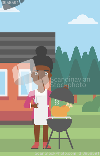 Image of Woman preparing barbecue.