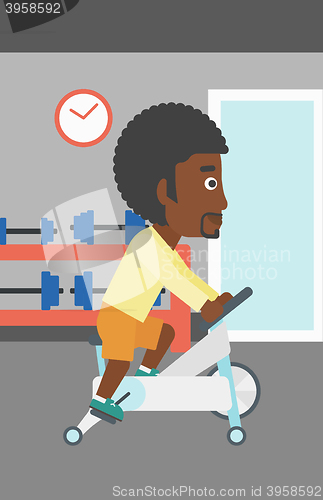 Image of Man doing cycling exercise.
