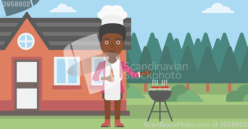 Image of Woman preparing barbecue.