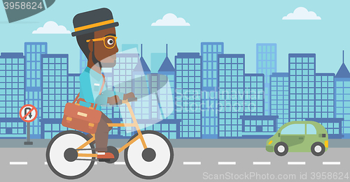 Image of Man cycling to work.