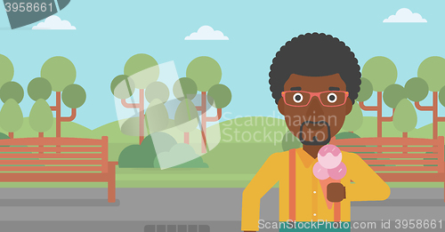 Image of Man holding icecream.