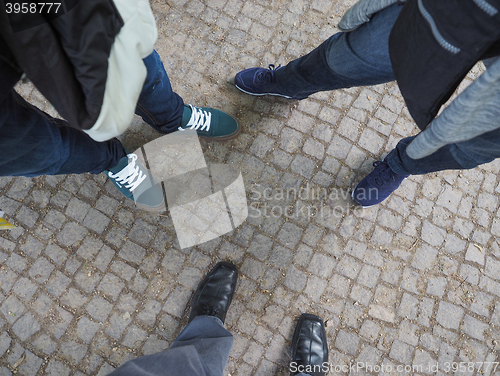 Image of Three people feet