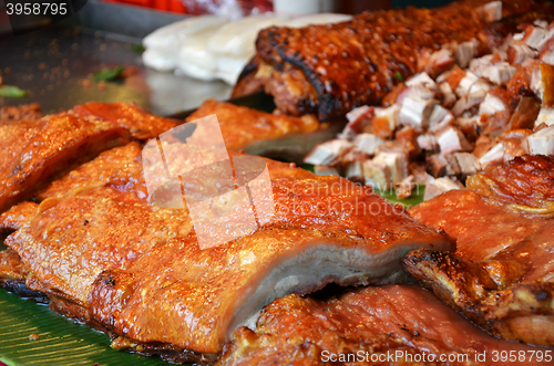 Image of Roasted Pork in Market